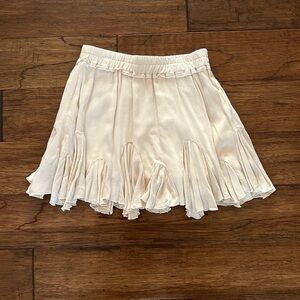 NWT. NEVER BEEN WORN. Cream flowy mini skirt.